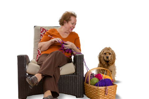 Woman contentedly knitting